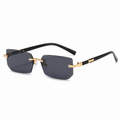 NOCT Sigil rimless narrow beveled rectangle sunglasses in Gold / Smoke on a white background